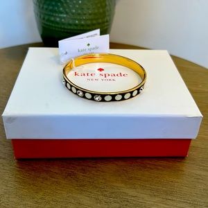 Kate Spade bangle. Gold with black and tan enamel and diamond detail.